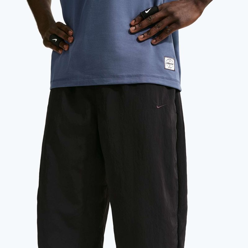 Штани чоловічі Nike N.A.C. Dri-Fit Woven black/pale ivory/black 5