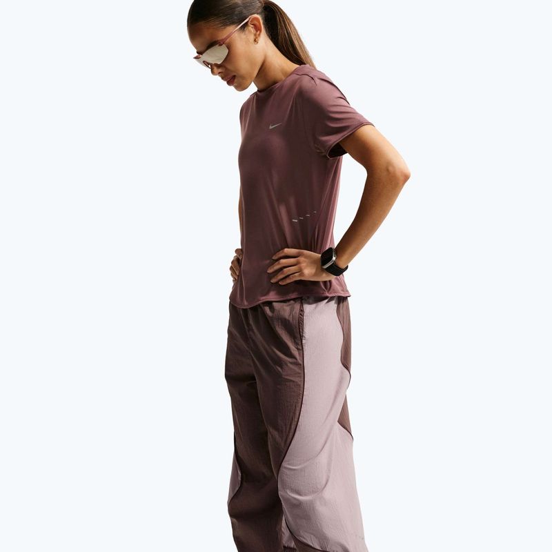 Штани для бігу жіночі Nike Swift UV Repel Mid-Rise tattoo/light violet ore 6